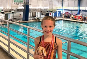 Alex with Medal 