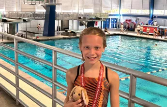 Alex with Medal 